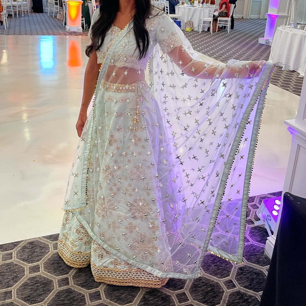 Lehenga Choli, blouse, dupata, and jewelry